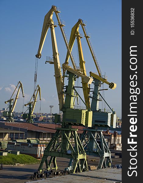 Cranes in the cargo port in the Sankt Petersburg, Russia. Cranes in the cargo port in the Sankt Petersburg, Russia