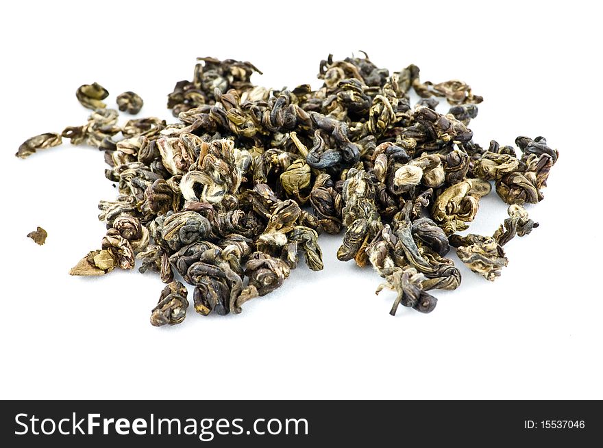 Leaves of green tea on white isolated background