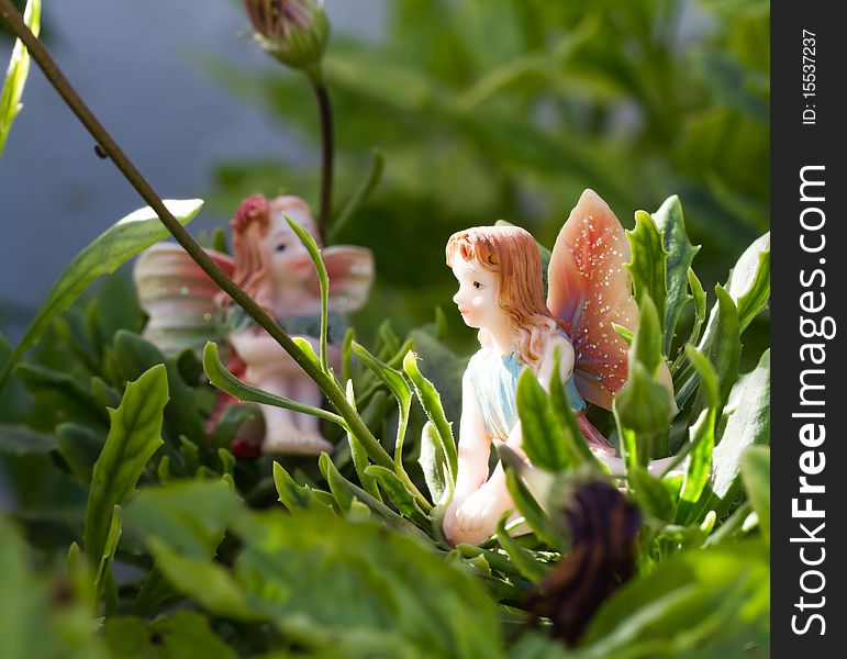 Generic dolls shaped fairy on vegetation. Generic dolls shaped fairy on vegetation