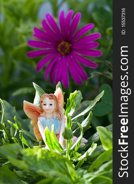Generic doll form of fairy on vegetation