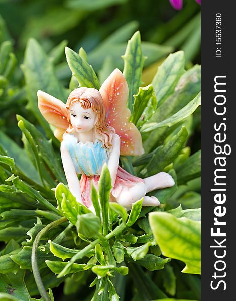 Generic doll form of fairy on vegetation