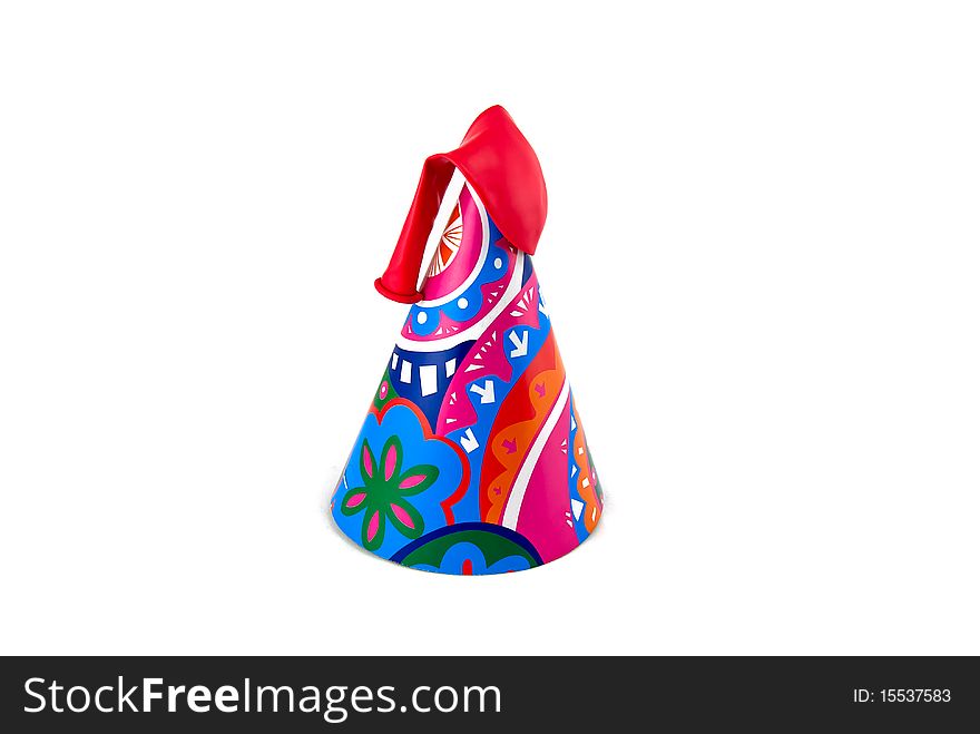 Studio shot of party hat, baloon,on white
