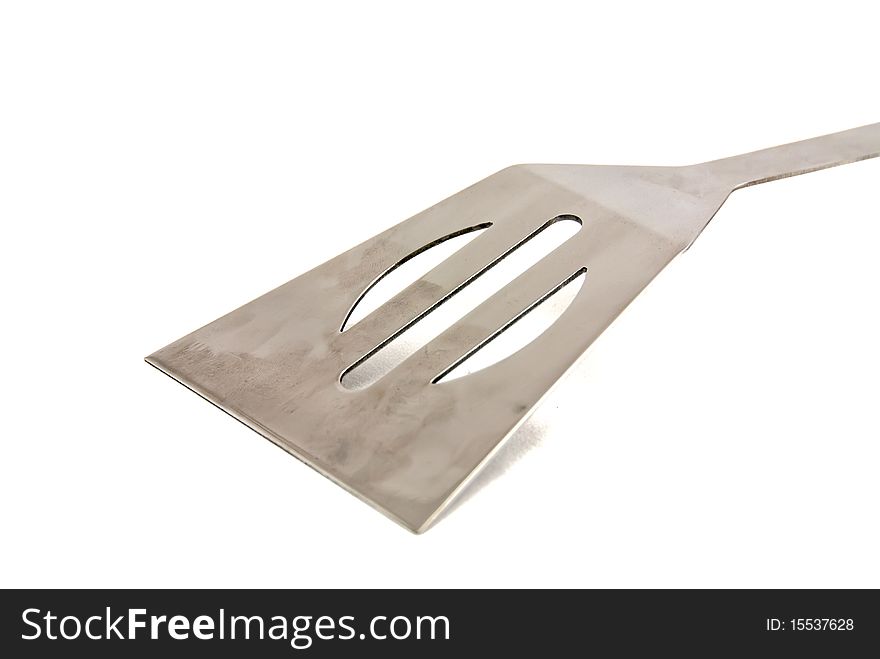 Studio shot of a kitchen spatula on a white background. Studio shot of a kitchen spatula on a white background.