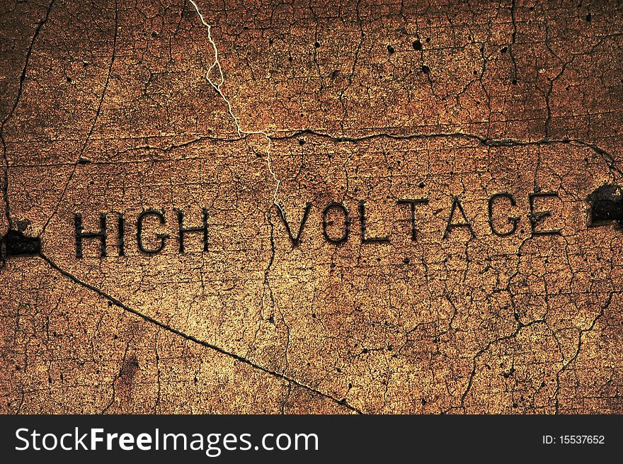 Image of High Voltage carved in cement with voltage running through. Image of High Voltage carved in cement with voltage running through