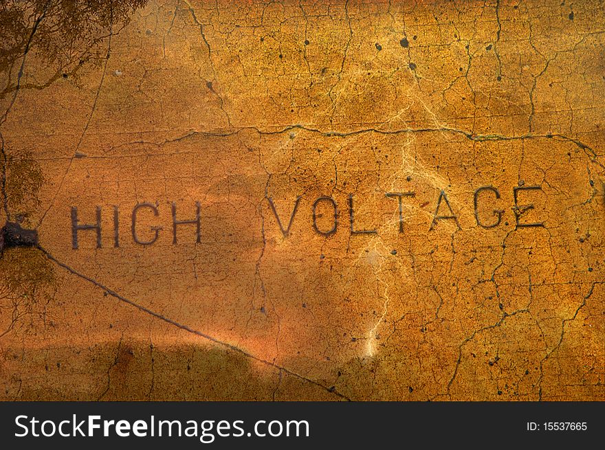 Image of High Voltage carved in cement with overlay of lightening running through.
. Image of High Voltage carved in cement with overlay of lightening running through.