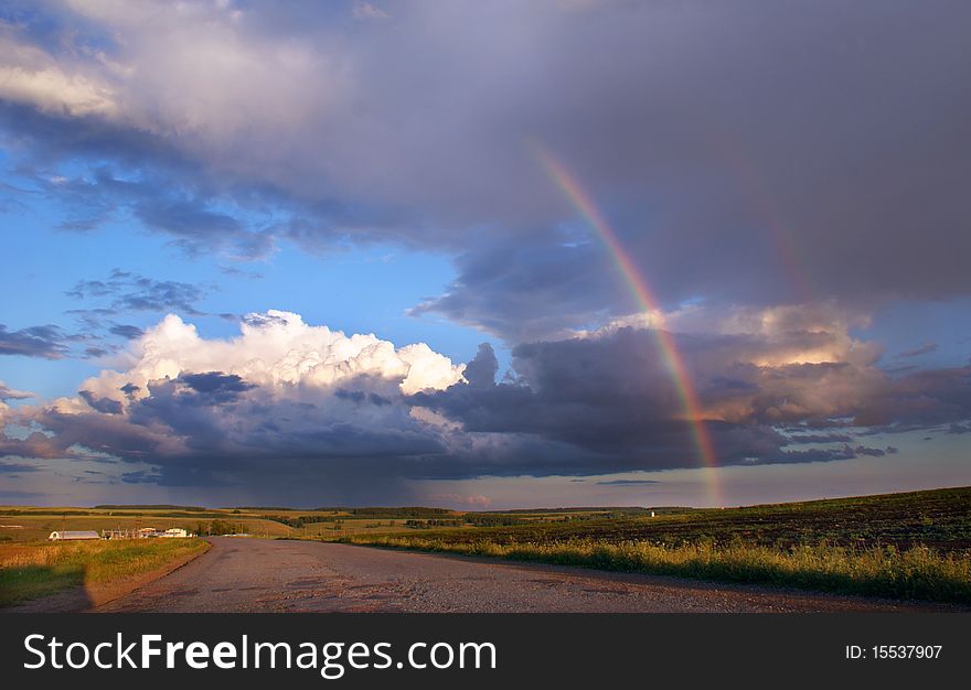 Beautiful rainbow over the field