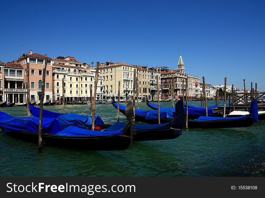 Gondolas at the grand canal, Venice. Gondolas at the grand canal, Venice