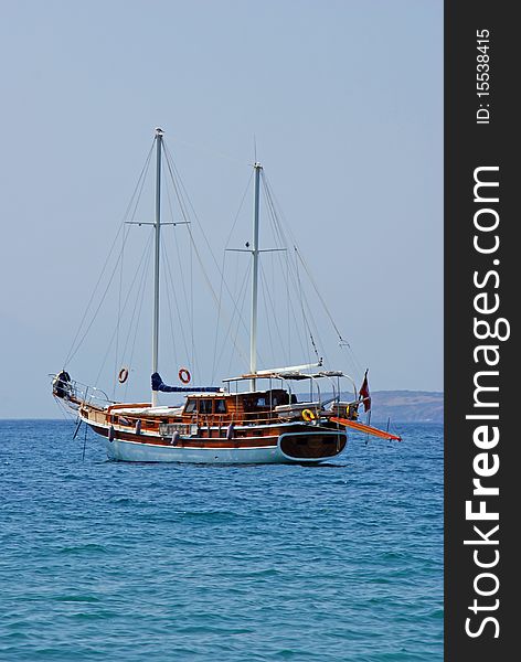 Wooden prow floating on the calm ocean