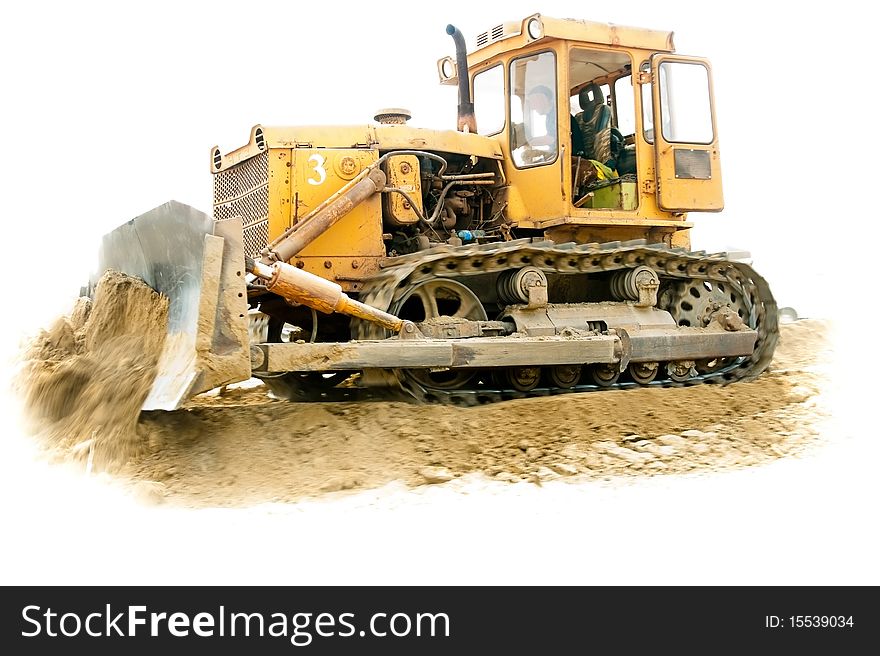 Isolated on white bulldozer in motion. Logos and trademarks have been removed. Men working are unrecognizable. Bright sunny  day.