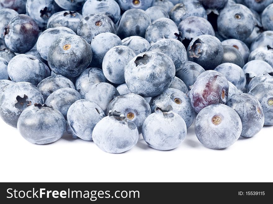 Bunch of fresh blueberries on white background. Bunch of fresh blueberries on white background.