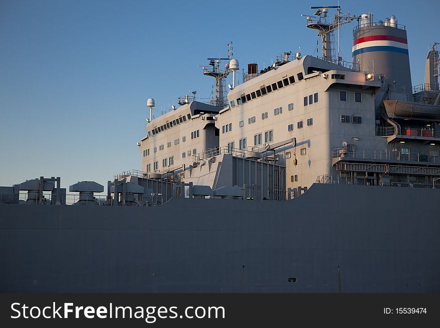 Close view of the tower of a tanker with blue sky at the back