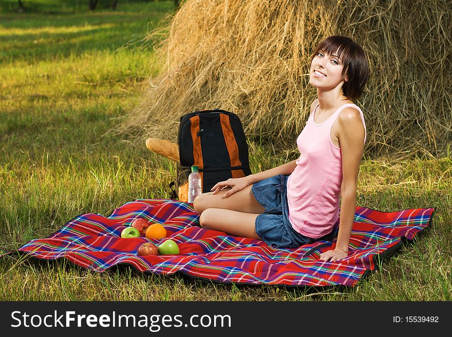 Lovely girl having a rest on picnic. Lovely girl having a rest on picnic