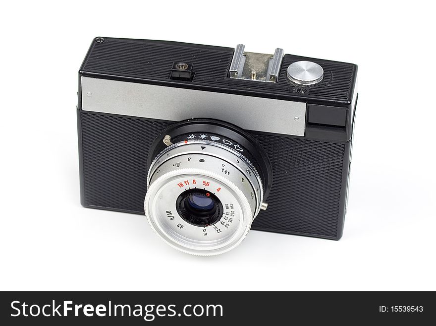 Old 35mm film camera isolated on white