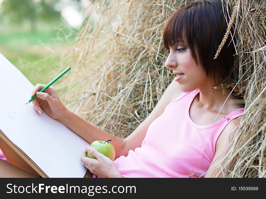 Lovely Girl Drawing In The Park