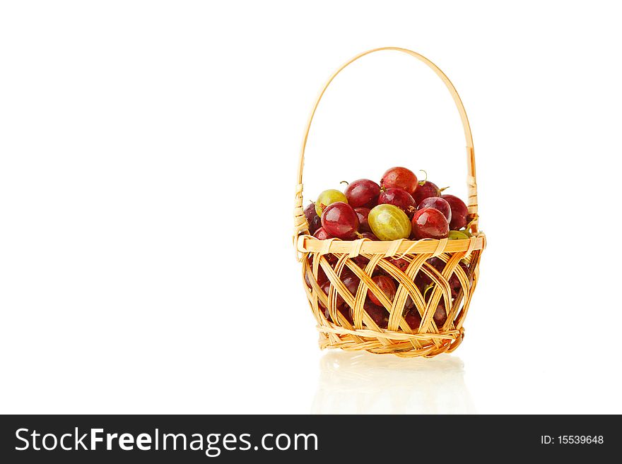 Gooseberries in the basket against white background