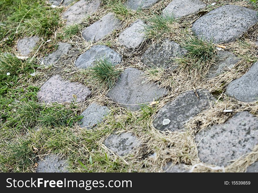 Nice piece of land containing green and stones. Nice piece of land containing green and stones