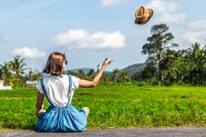 Free Tropical Portrait Of Young Happy Woman With Straw Hat On A Road With Coconut Palms And Tropical Trees. Bali Island. Royalty Free Stock Photos - 155396638