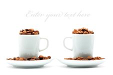 Two Cups On Plates Filled With Coffee Beans Royalty Free Stock Images Two Cups On Plates Filled With Coffee Beans Royalty Free Stock Images