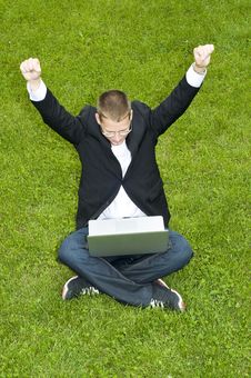 Happy Businessman On The Grass With Laptop Royalty Free Stock Photos Happy Businessman On The Grass With Laptop Royalty Free Stock Photos