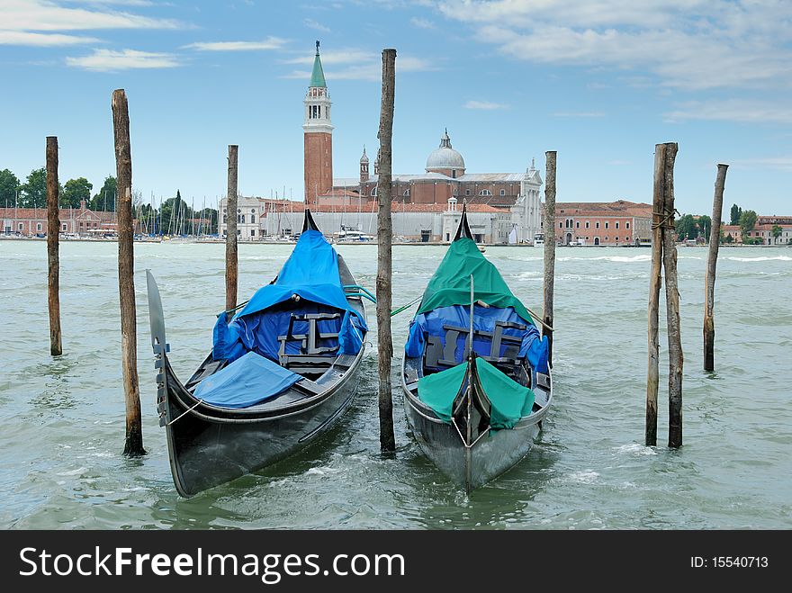 Two gondolas on the San Marco canal and Church of San Giorgio Maggiore in Venice, Italia. Two gondolas on the San Marco canal and Church of San Giorgio Maggiore in Venice, Italia.