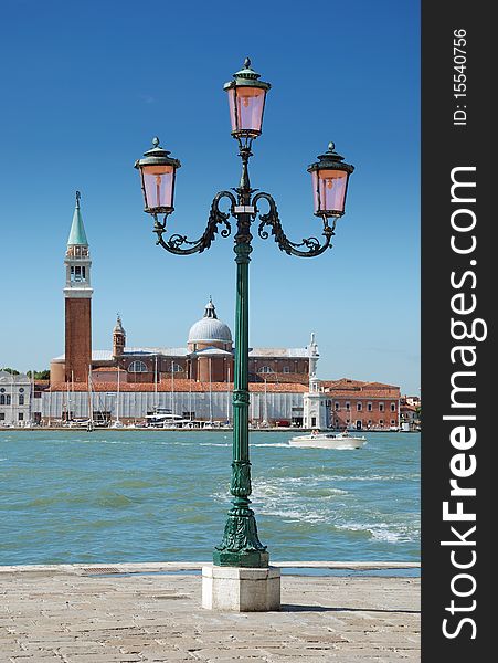 Lamppost on the quay Riva degli Schiavoni and Church of San Giorgio Maggiore in Venice, Italia. Lamppost on the quay Riva degli Schiavoni and Church of San Giorgio Maggiore in Venice, Italia.