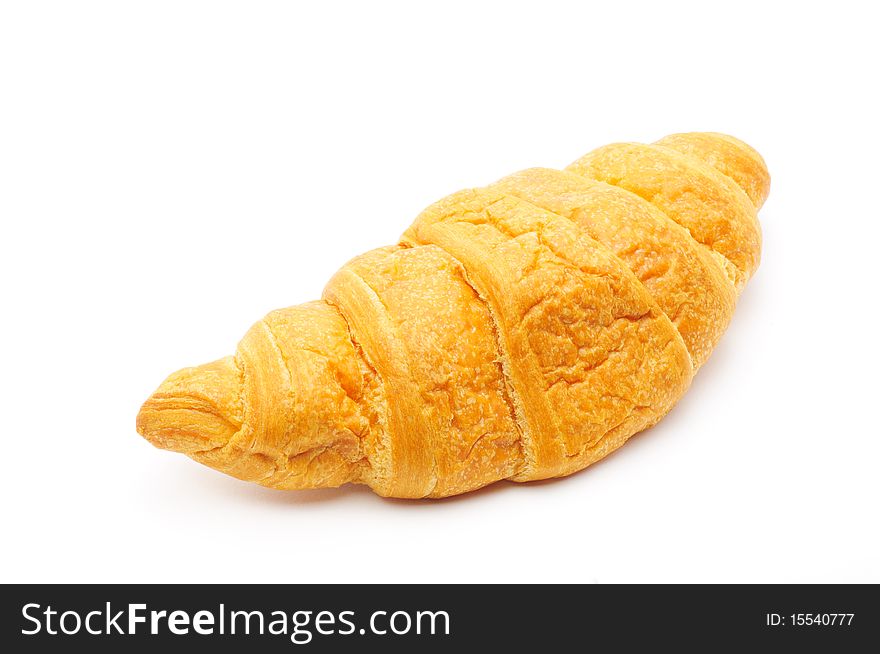 Fresh croissant isolated over white