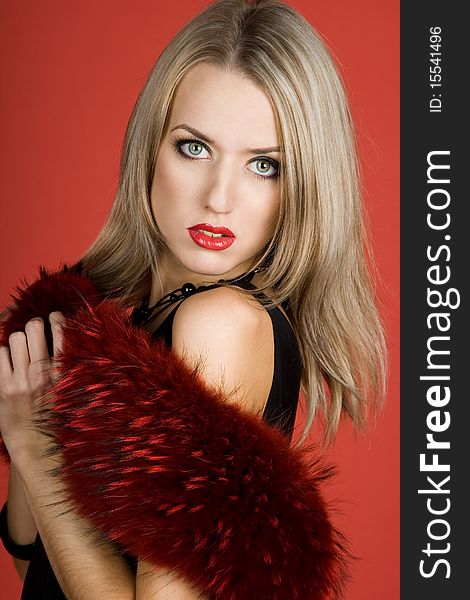 Fashionable woman with red fur