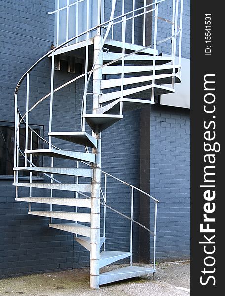 Image of a spiral staircase hpoto take in day light. Image of a spiral staircase hpoto take in day light
