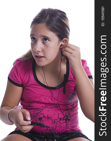 Girl listen to music on the headphones