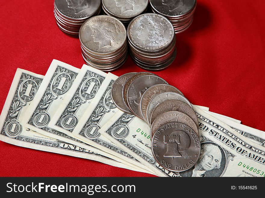 USA silver dollar bills and silver coins