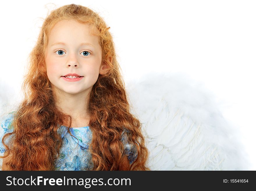 Portrait of a cute red-haired girl angel. Isolated over white background. Portrait of a cute red-haired girl angel. Isolated over white background.