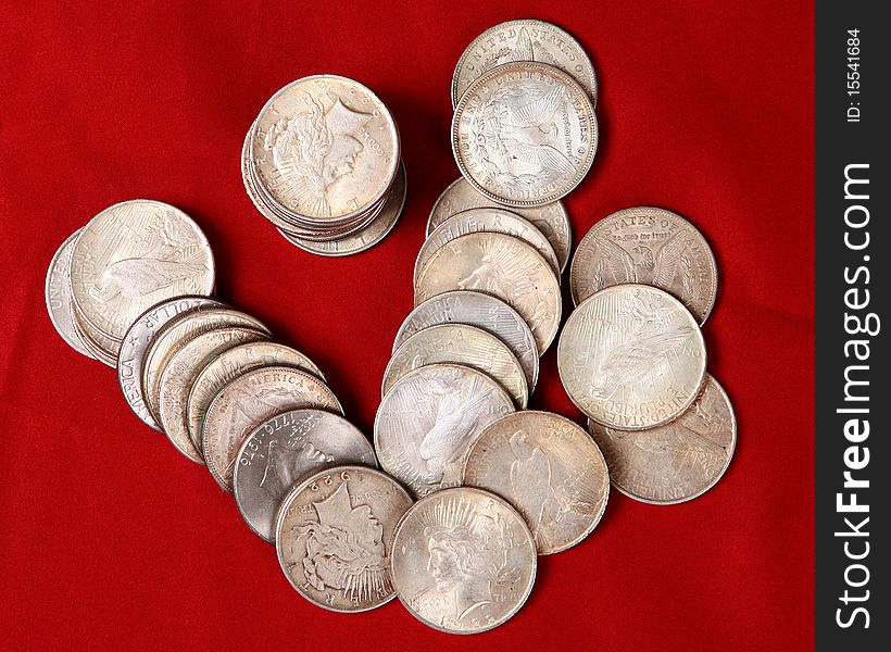 Great money image featuring antique silver dollars from various years. Great money image featuring antique silver dollars from various years