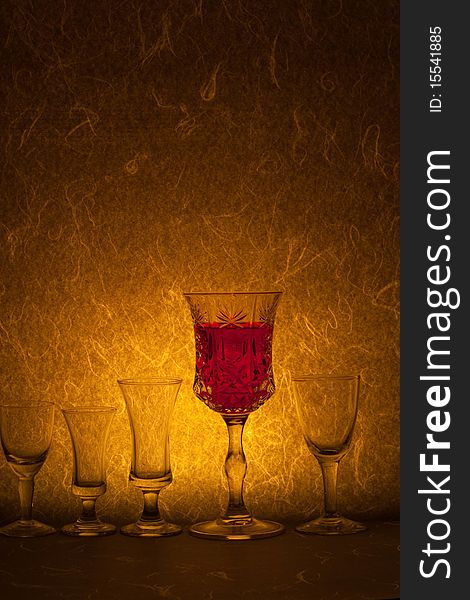 Red wine on yellow background
