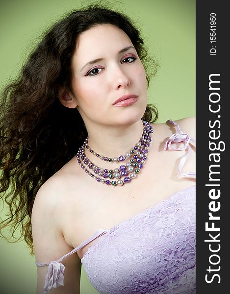 Beautiful young woman in lacy lavender dress. Beautiful young woman in lacy lavender dress
