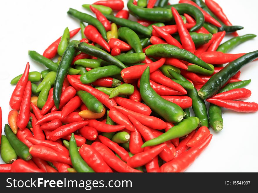 Red and green chili on isolated background. Red and green chili on isolated background