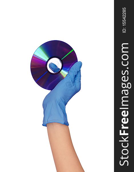 Disk with dangerous confidential audio and video about hacker programs and viruses in a hand of the inspector. Disk with dangerous confidential audio and video about hacker programs and viruses in a hand of the inspector