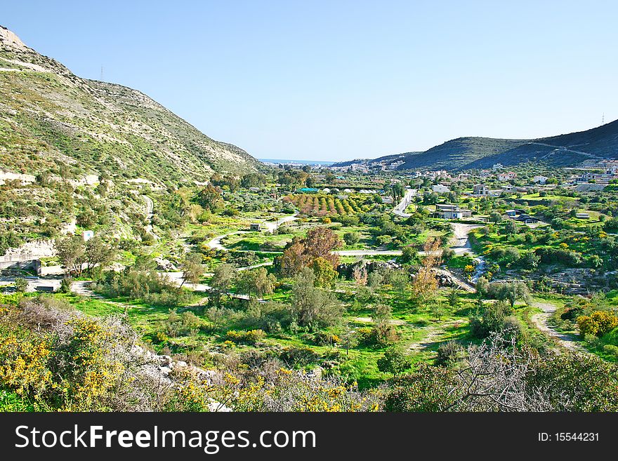 Cyprus landscape with gardens,mountain village, paths.