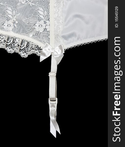 White lace on white background with garter