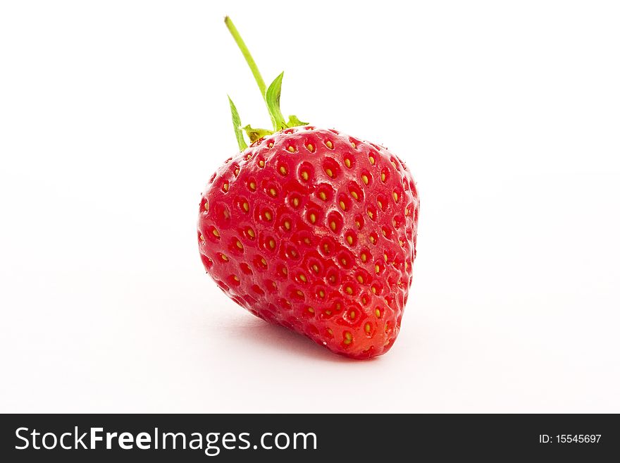 Red strawberry isolated on white close-up