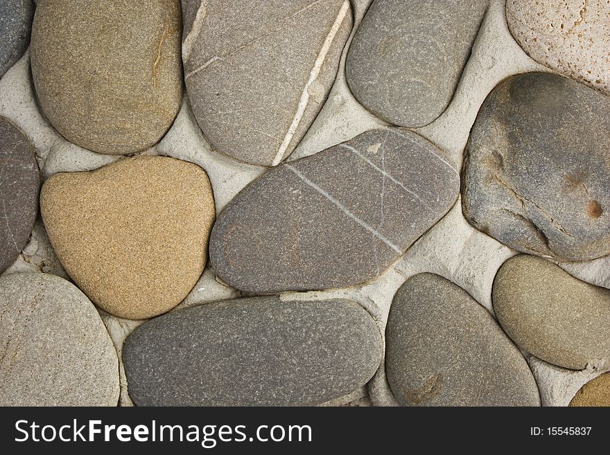 Close-up of wall made of sea stones. Close-up of wall made of sea stones