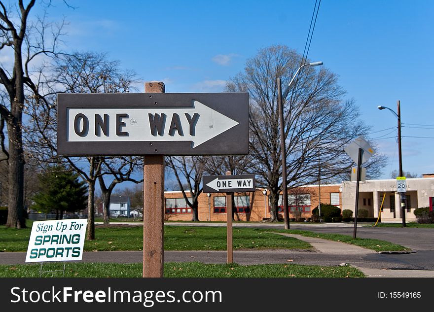 A group of signs often seen in a busy metropolitan area. A group of signs often seen in a busy metropolitan area.