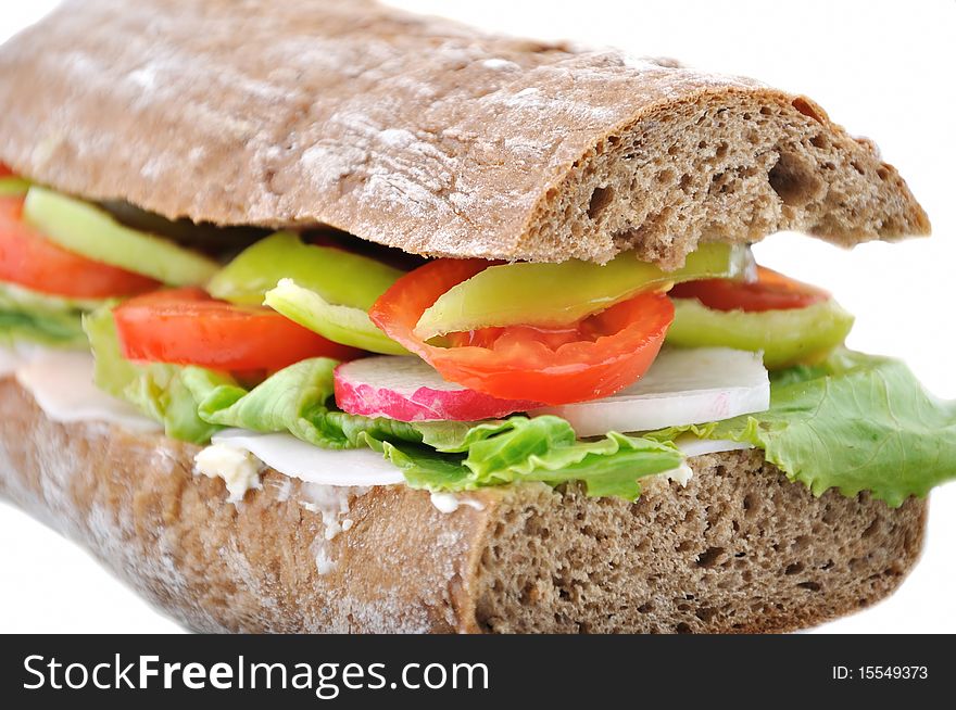 Diet brown baguette with vegetable, isolated on white background