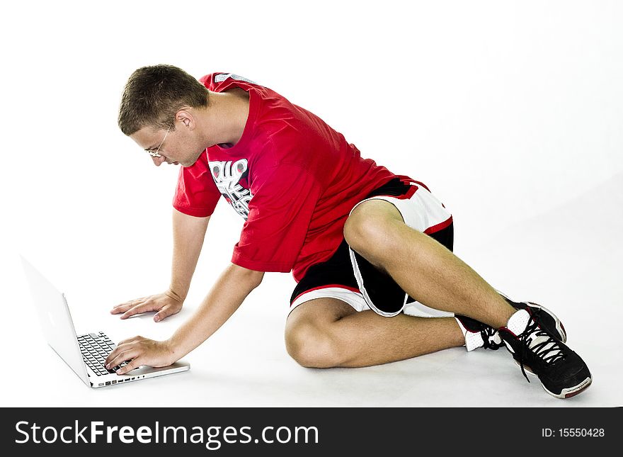 Teenager with laptop, isolated on white background