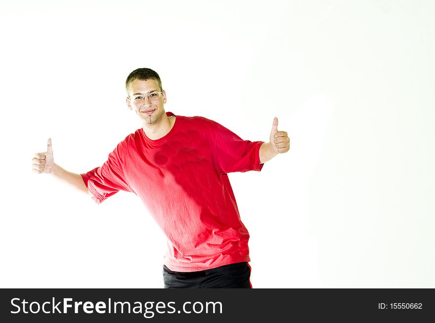 Young, happy, natural, cheerful man with thumbs up, isolated on white background