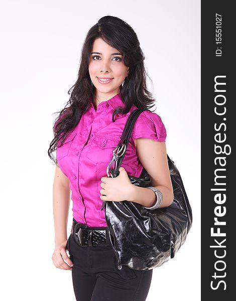 Woman with black bag smiling and looking at the camera. Woman with black bag smiling and looking at the camera