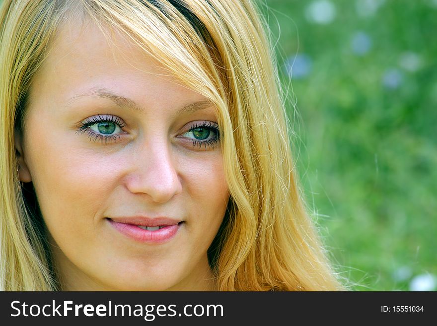 Face of a young girl being in nature