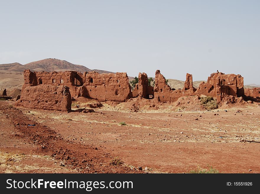The ruins of the clay wall at Telouet palace in Morocco. The ruins of the clay wall at Telouet palace in Morocco