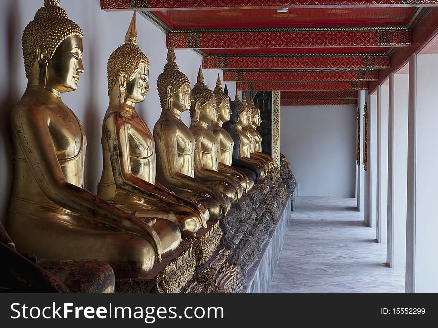 The perspective view of the buddha images or statues in a temple in Bangkok, Thailand. The perspective view of the buddha images or statues in a temple in Bangkok, Thailand.