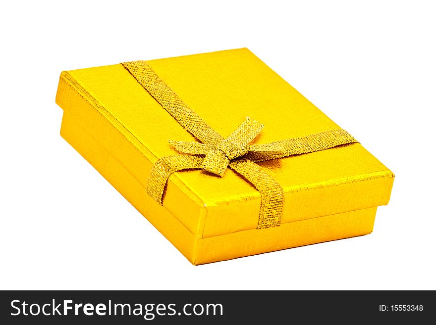 Attractive yellow gift box isolated on white background