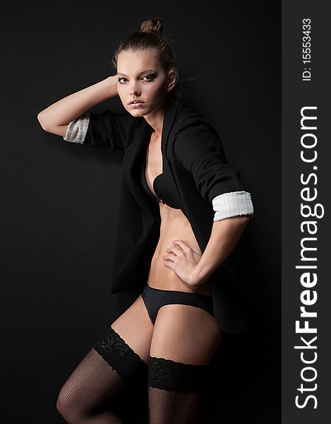 Girl In Stockings And Black Jacket